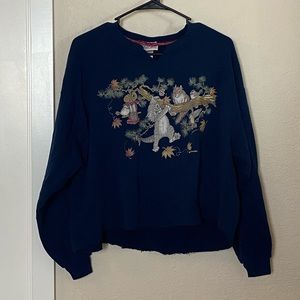 Sweater with graphic. Custom alterations. OK condition.